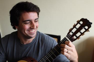 headshot with guitar