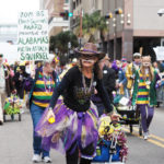 The Joe Cain Procession winds through downtown Mobile, Ala., during Mardi Gras on Sunday, Feb. 27, 2022, in (Mike Kittrell/AL.com)