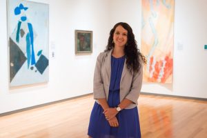 woman standing in gallery