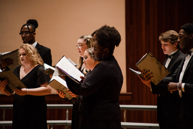 choir members singing