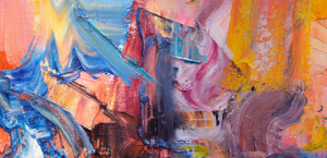 Abstract art piece with pinks, orange, blue and gray