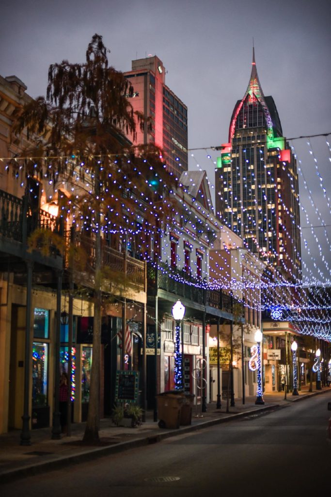 Photo of Dauphin Street in Mobile, AL decorated for the holidays