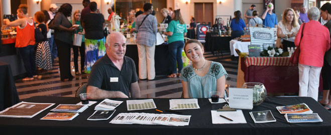 Mobile Museum of Art’s Volunteers greeting guests at an event