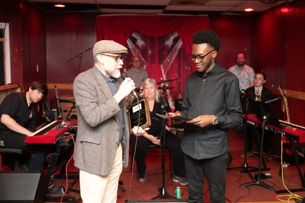 Kevin Lee Mystic Order of the Jazz Obsessed, MOJO, Founder giving an award
