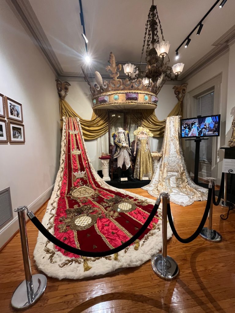 Views inside exhibition of king and queen attire at Mobile Carnival Museum 