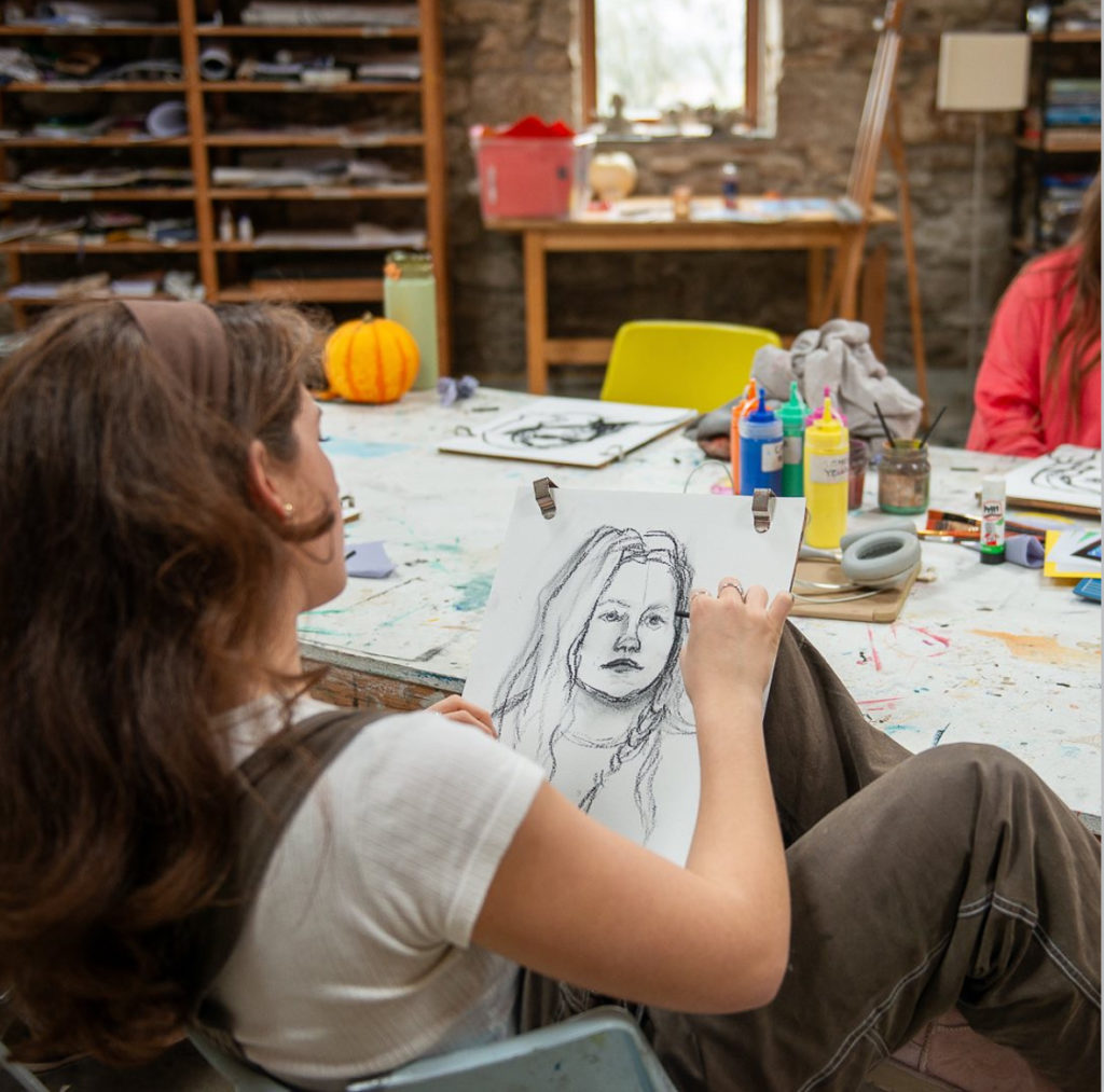 Phoebe Graham Artist Member of the Month sketching